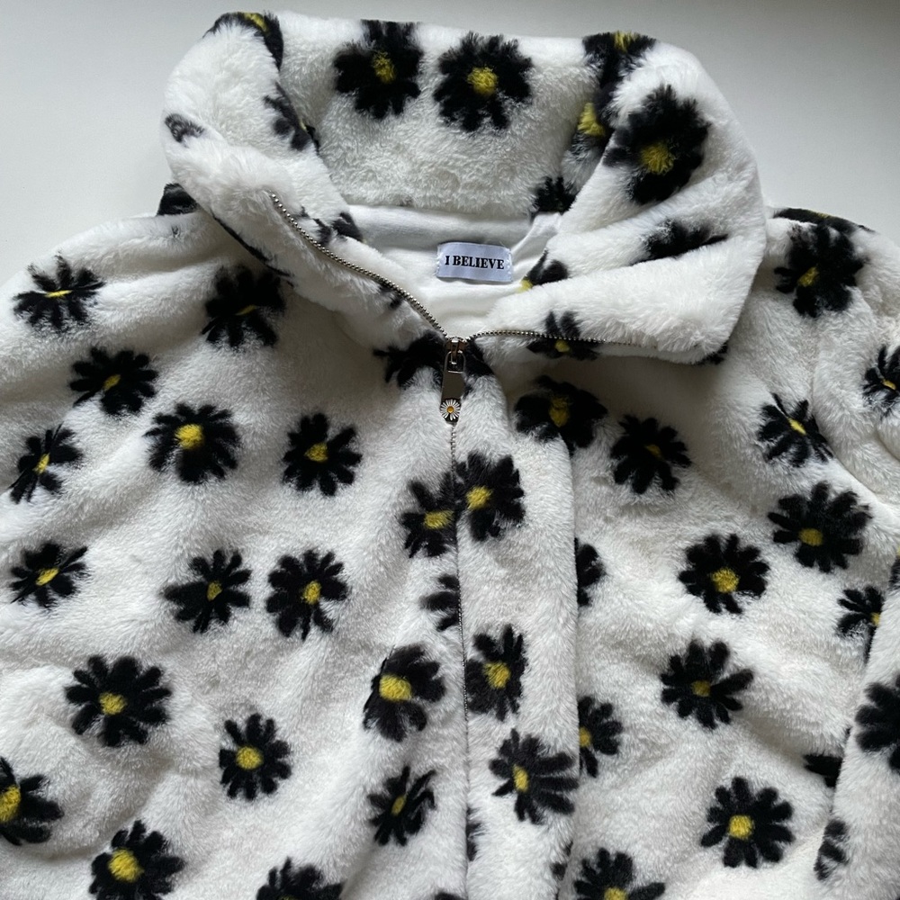 Brand new fluffy soft white floral jacket.